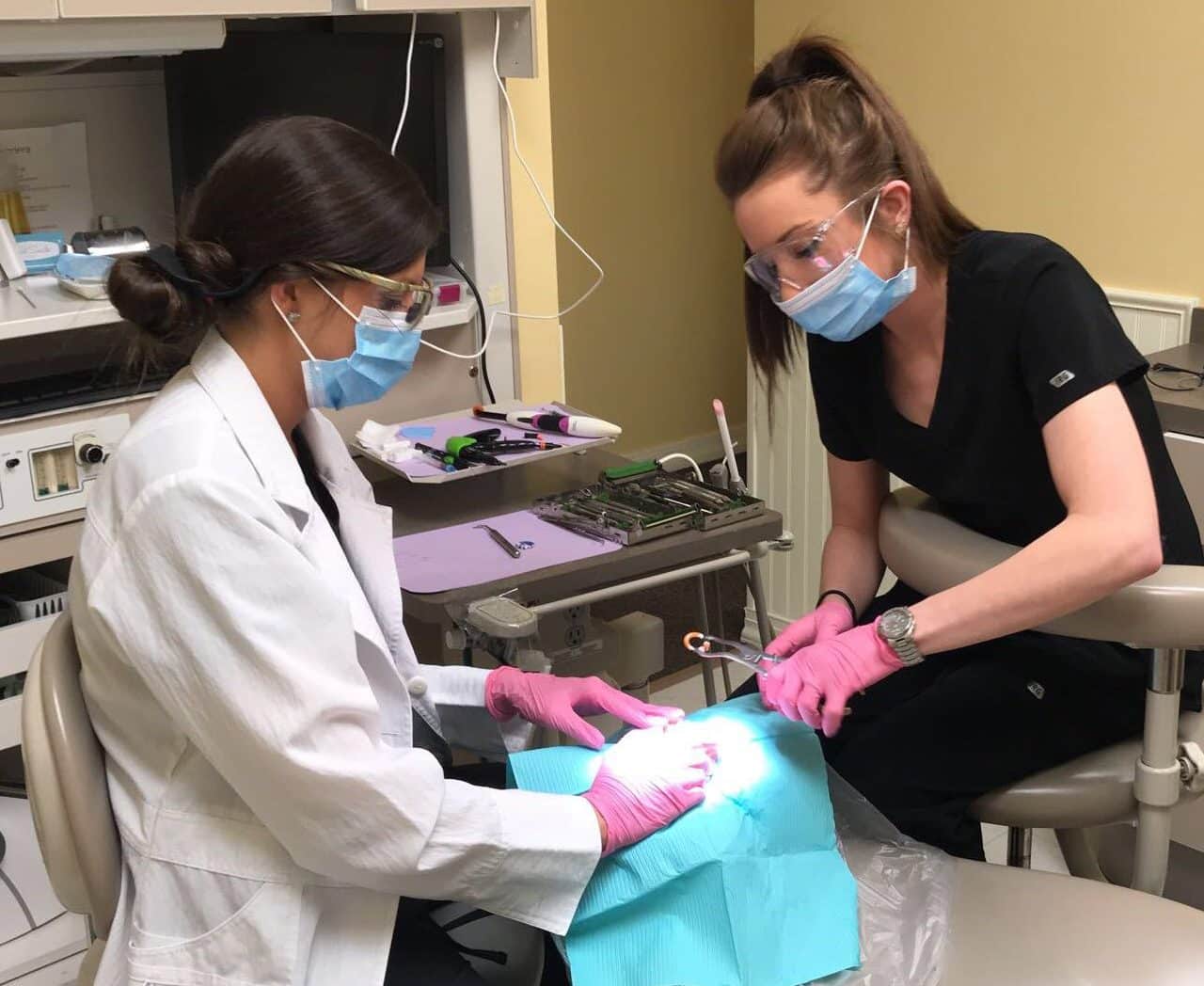 Tulsa Dental Assisting School student learning how to place composite bands.
